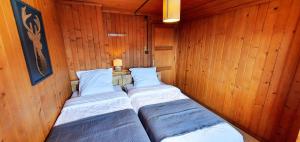 Letto o letti in una camera di Auberge le Mont-Gelé
