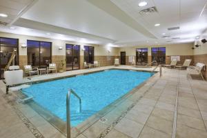 a large swimming pool in a hotel room at Hampton Inn Brockport in Brockport