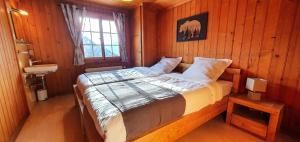 Letto o letti in una camera di Auberge le Mont-Gelé