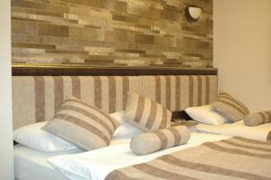 Voodi või voodid majutusasutuse Konak Saray Hotel toas