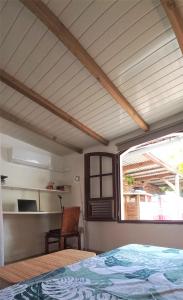 Voodi või voodid majutusasutuse Villa Pomme cannelle toas