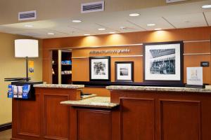 a waiting room with a counter in a store at Hampton Inn & Suites Arroyo Grande in Arroyo Grande
