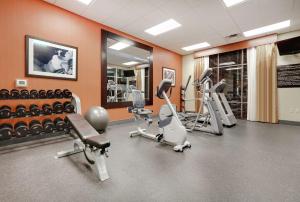 a gym with several treadmills and exercise bikes at Hampton Inn & Suites Southern Pines-Pinehurst in Aberdeen