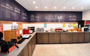 a fast food restaurant with a large counter with a counter at Hampton Inn Santee-I-95 in Santee