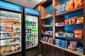 a refrigerator filled with lots of food and drinks at Hampton Inn Santee-I-95 in Santee