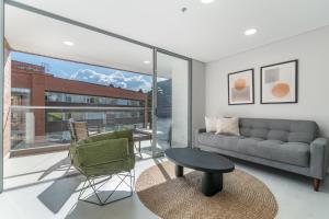Predel za sedenje v nastanitvi PORTANOVA Suites by ADVENTU