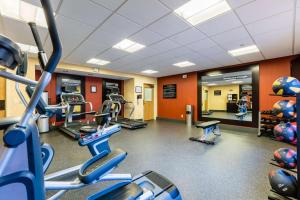 a gym with several treadmills and cardio machines at Hampton Inn St Charles St Peters in St. Charles