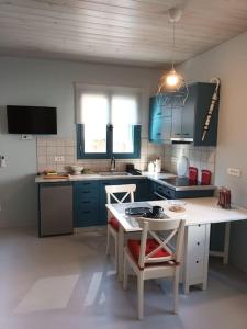 Kuchyň nebo kuchyňský kout v ubytování Studio Bella