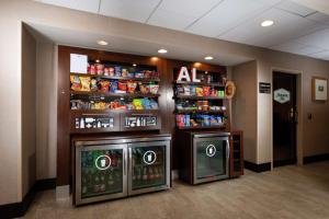 a drink station with two vending machines in a lobby at Hampton Inn Tuscaloosa - East in Tuscaloosa