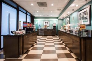 a hair salon with a checkered floor at Hampton Inn & Suites Toledo/Westgate in Toledo