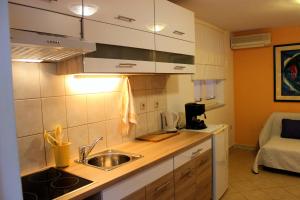 Kuchyň nebo kuchyňský kout v ubytování Apartment Marko