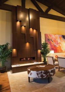 a living room with a couch and a fireplace at DoubleTree Suites by Hilton Tucson-Williams Center in Tucson