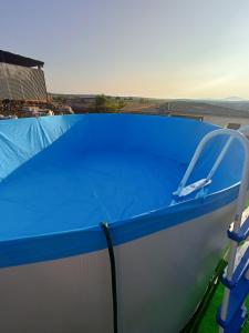 The swimming pool at or close to Casa Rural Pozo Cinojal