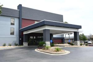 a parking lot in front of a building at Hampton Inn Valdosta/Lake Park Area in Lake Park