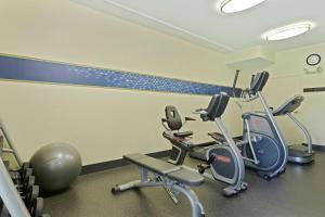a gym with three exercise bikes in a room at Hampton Inn & Suites Venice Bayside South Sarasota in Venice