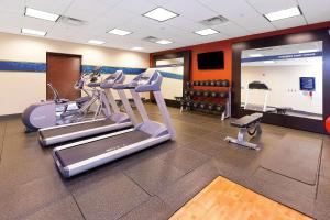 a gym with treadmills and ellipticals in a room at Hampton Inn Waynesburg in Waynesburg