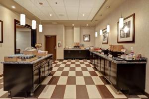 a hotel lobby with a checkerboardkered floor at Hampton Inn by Hilton Chilliwack in Chilliwack