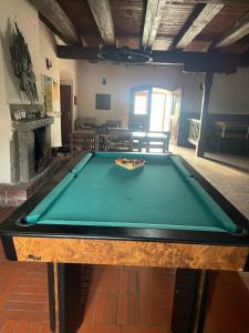 a pool table in the middle of a room at Zájezdní hostinec Labuť 