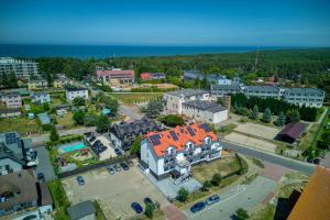 an aerial view of a city with a building at AURORA JAROSŁAWIEC in Jarosławiec