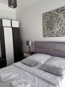 Apartament Lipska tesisinde bir odada yatak veya yataklar