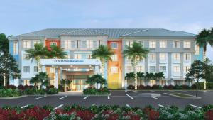 an artist rendering of the front of a building at Compass by Margaritaville Hotel Naples in Naples