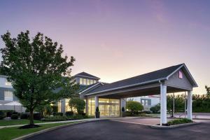 a rendering of a building with a pavilion at Hilton Garden Inn Allentown West in Breinigsville