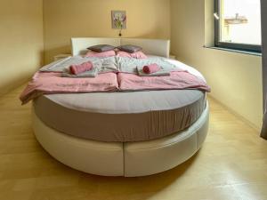 A bed or beds in a room at Máté Pension