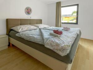 A bed or beds in a room at Máté Pension