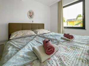 A bed or beds in a room at Máté Pension