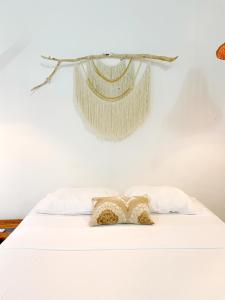 Llit o llits en una habitació de Hermosa y céntrica casa Altamar