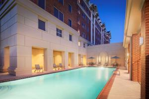 a swimming pool in the middle of a building at DoubleTree by Hilton Atlanta/Roswell - Alpharetta Area in Roswell