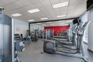 a gym with treadmills and elliptical machines at Hilton Garden Inn Atlanta Marietta in Atlanta