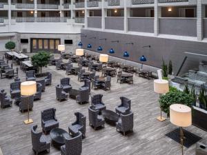 an overhead view of a patio with chairs and tables at Embassy Suites Baltimore - North/Hunt Valley in Hunt Valley