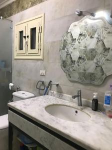 Kúpeľňa v ubytovaní Luxury apartment (Families or same gender only)