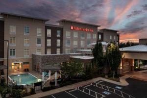 a rendering of a hotel with a swimming pool at Hilton Garden Inn Murfreesboro in Murfreesboro