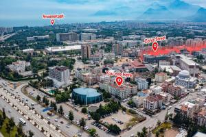 Nespecifikovaný výhled na destinaci Antalya nebo výhled na město při pohledu z apartmánu