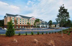 a rendering of a hotel with a large building at Hilton Garden Inn Columbia/Northeast in Columbia