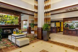 a lobby of a hotel with a reception desk at Hilton Garden Inn Cleveland East / Mayfield Village in Mayfield