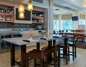 A restaurant or other place to eat at Hilton Garden Inn Charlotte Pineville