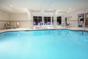 a large swimming pool in a hotel room at Hilton Garden Inn Casper in Casper