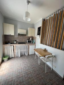Kuchyň nebo kuchyňský kout v ubytování Casa Fè