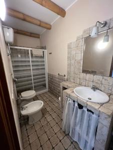 Koupelna v ubytování Casa Fè