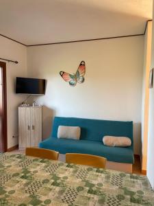 TV a/nebo společenská místnost v ubytování Veliero House