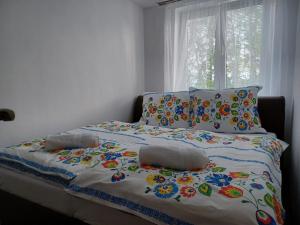 Postel nebo postele na pokoji v ubytování Apartmán 4M Tatry