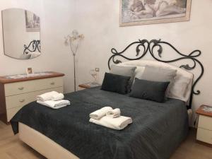 Postel nebo postele na pokoji v ubytování B&B Cardone