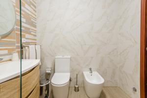 Koupelna v ubytování Apartamento T1 praia + 17 fotografií