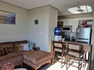 Kuchyň nebo kuchyňský kout v ubytování Apartamento en Asunción