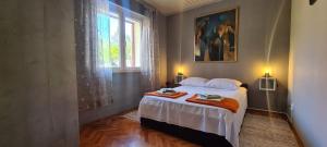 Postel nebo postele na pokoji v ubytování Apartment Bosiljak