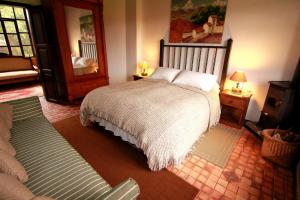 Postel nebo postele na pokoji v ubytování Hacienda Hato Verde