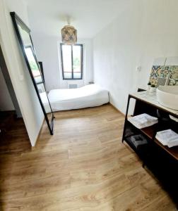 Postel nebo postele na pokoji v ubytování Maisonnette du Foirail + 35 fotografií